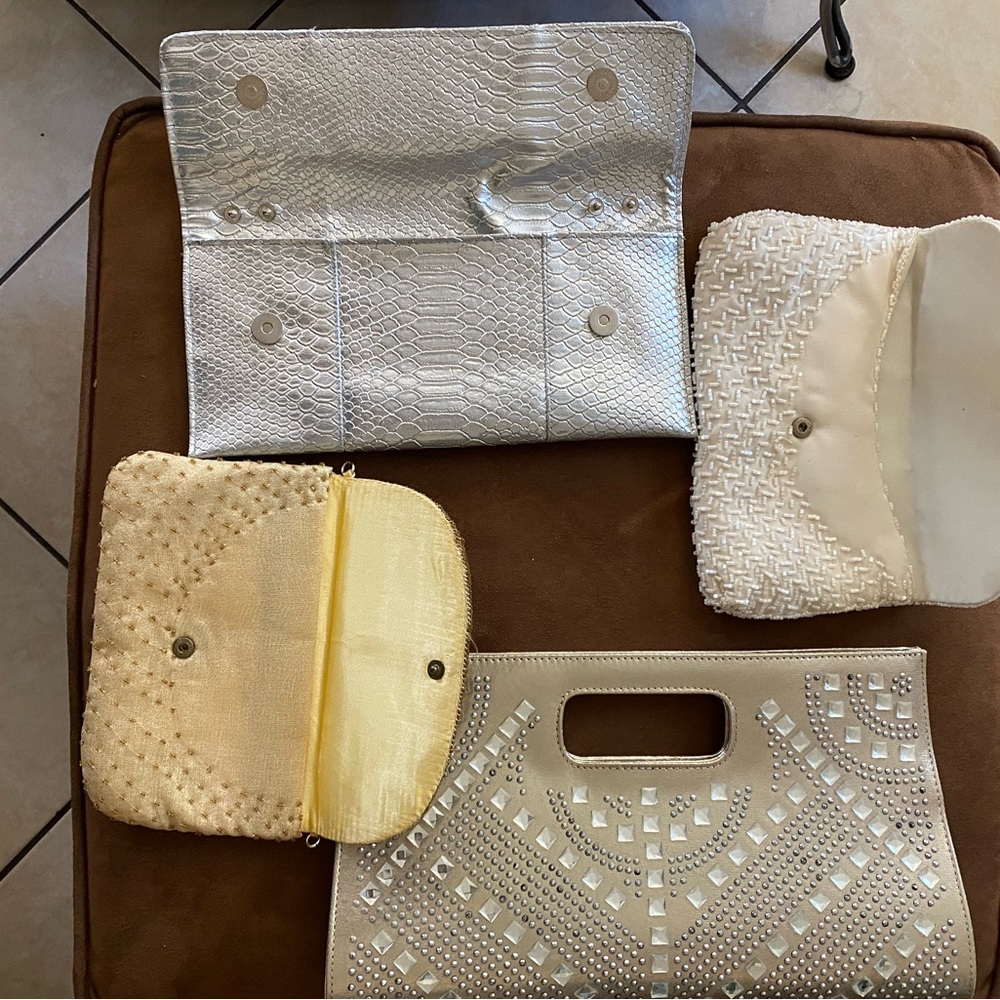4 Clutch  purse sale together.
